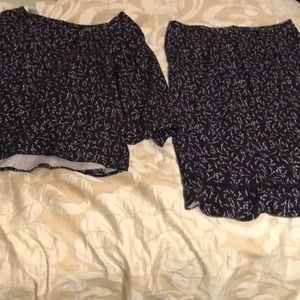 As a button down top and skirt set